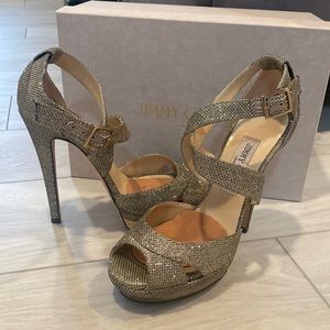 Gold shimmer platform evening Sandles. Worn once.  Too high for me.